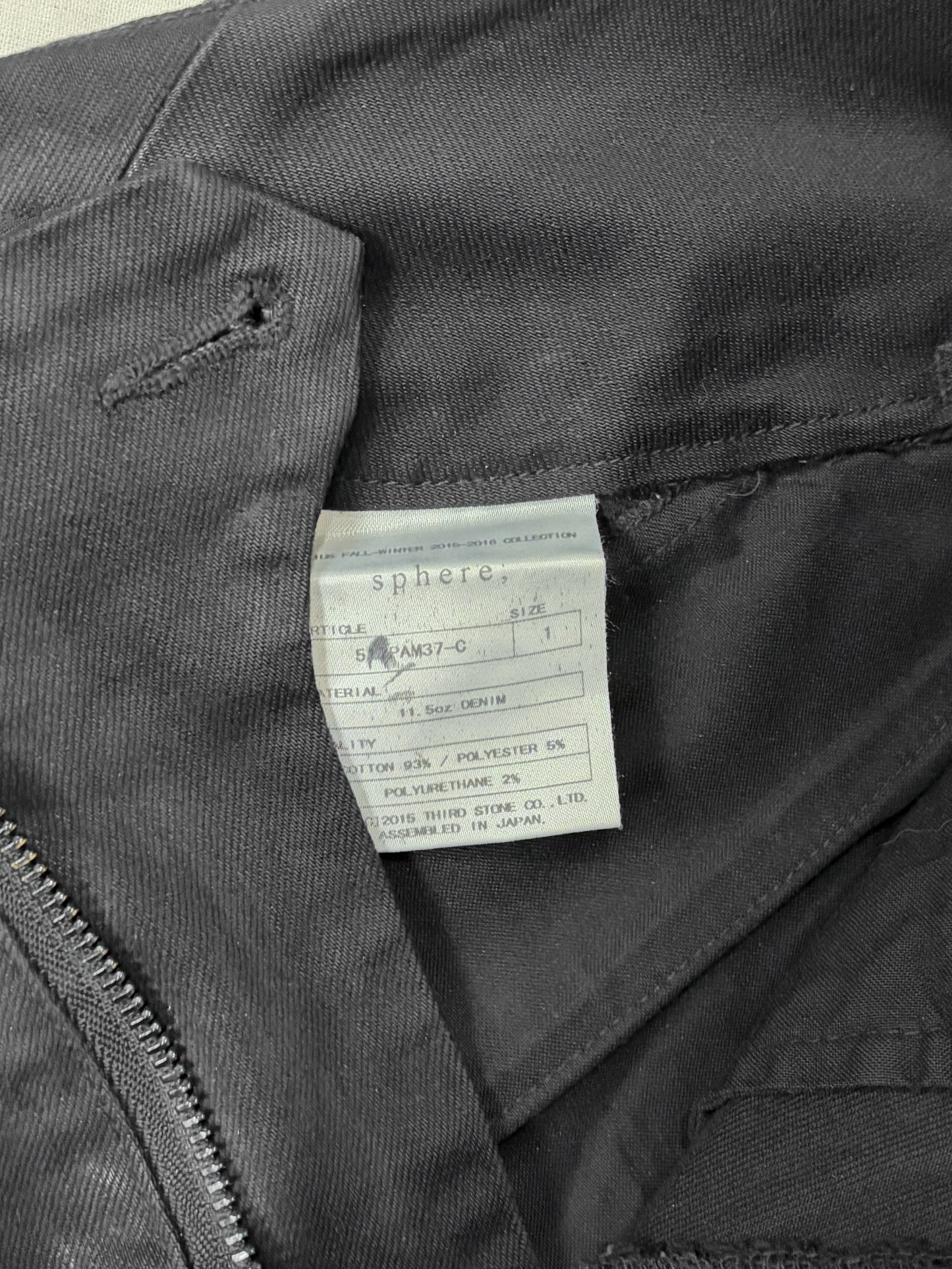 A/W2015 "SPHERE" GEOMETRIC CUT WAXED SKINNY JEANS